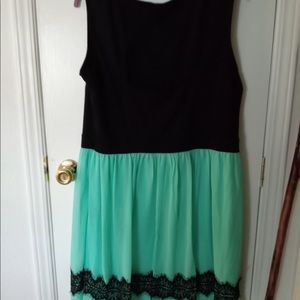Gorgeous green and black summer dress. you can wear this to a cocktail party.
